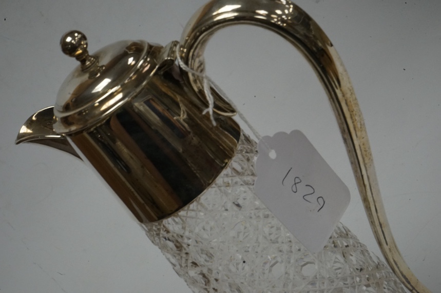 A George V silver mounted cut glass claret jug, Birmingham, 1911, height 25.3cm, Condition - poor to fair